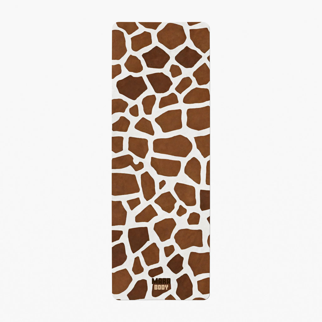 yoga mat with giraffe pattern on a white background