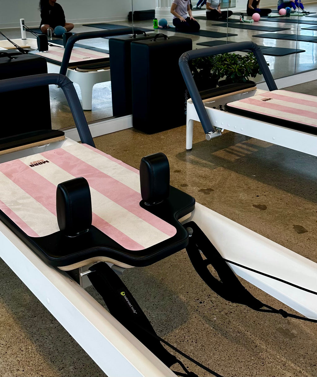 pink and white striped pilates reformer mat, pilates reformer mat, pilates reformer mat canada, mats for pilates reformer studio, beautiful pilates reformer mats, pilates reformer mats canada, microfiber pilates reformer mats, mats for pilates studio canada, mats for pilates studio, pilates mat canada, pilates reformer studio pinterest, pilates studio toronto, pilates studio vancouver, pilates studio ottawa, pilates studio montreal, reformer mat canada, reformer studio toronto, reformer studio montreal